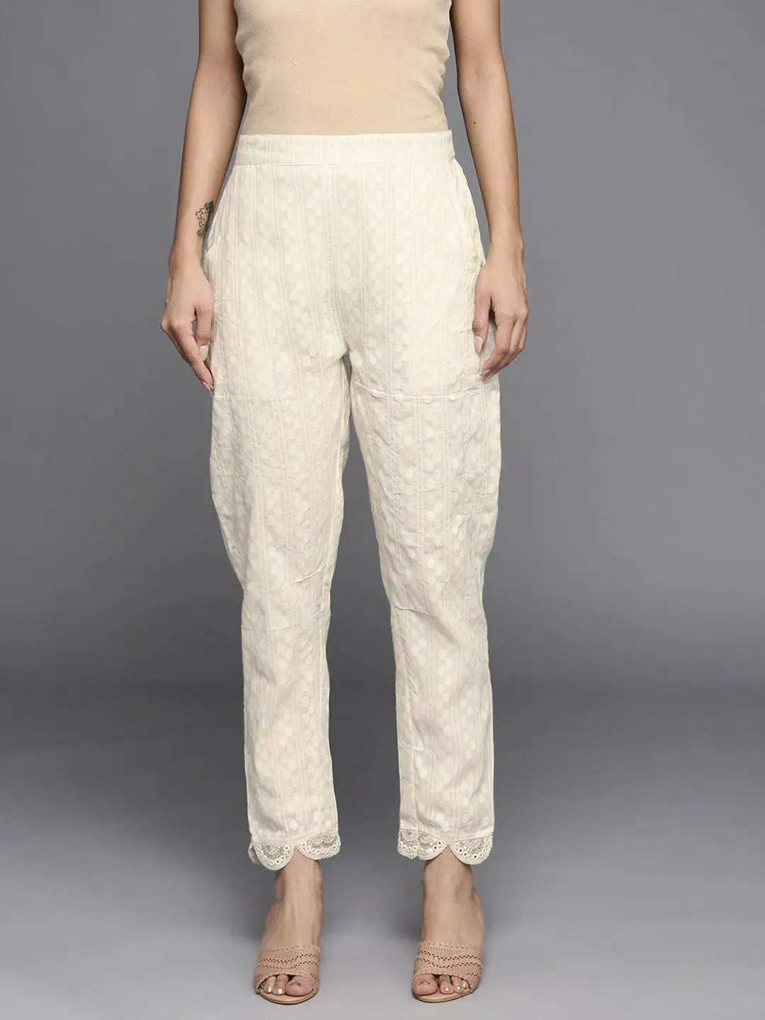 Cream Self Design Cotton Trousers - Libas