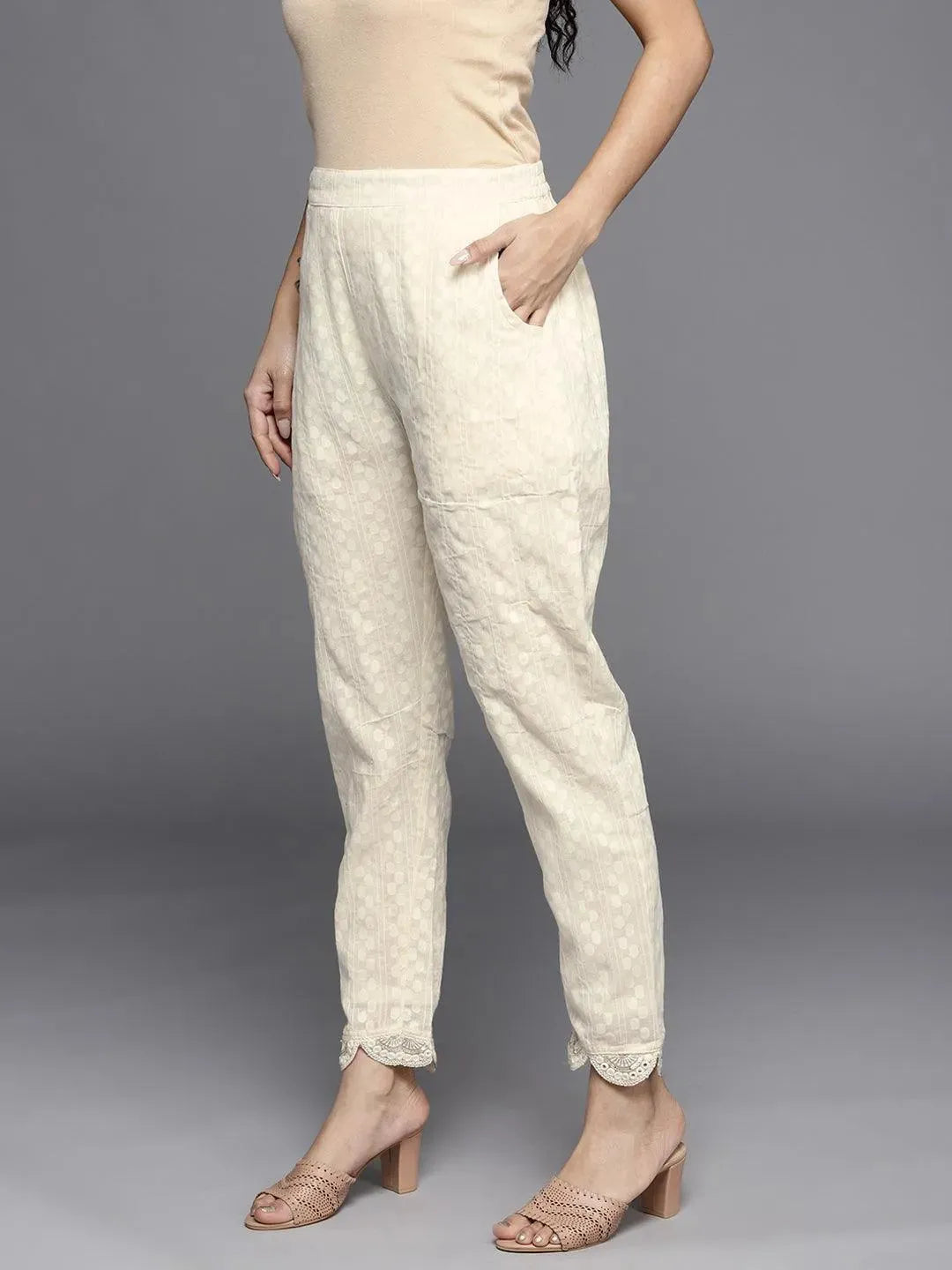 Cream Self Design Cotton Trousers - Libas 
