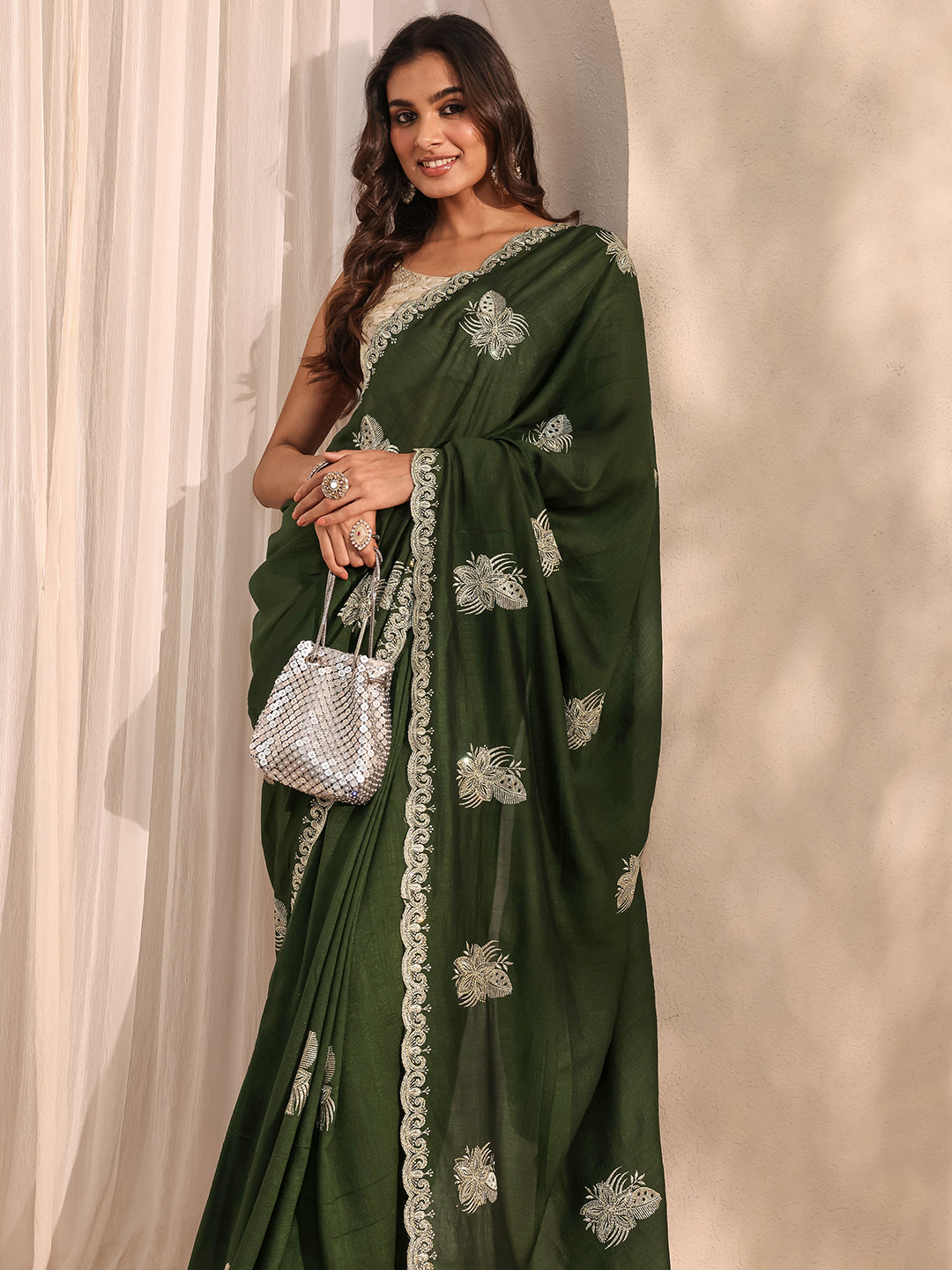 Green Embellished Silk Blend Saree 
With Unstitched Blouse Piece
