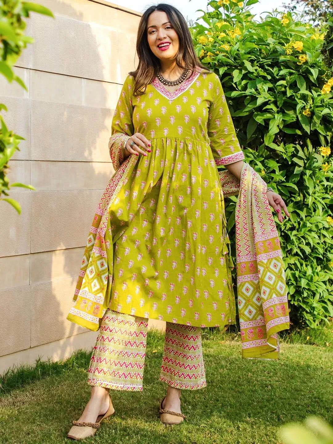 

Green Printed Cotton A-Line Kurta With Trousers & Dupatta