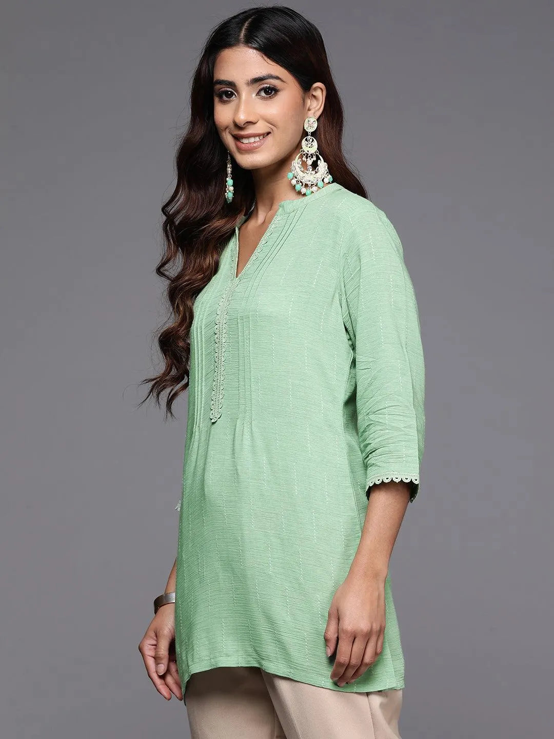 Green Woven Design Cotton Blend Straight Kurti - Libas 