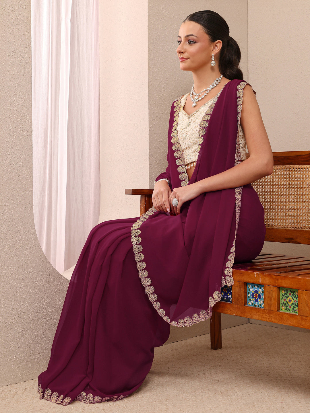 Maroon Embellished Silk Blend Saree 
With Unstitched Blouse Piece