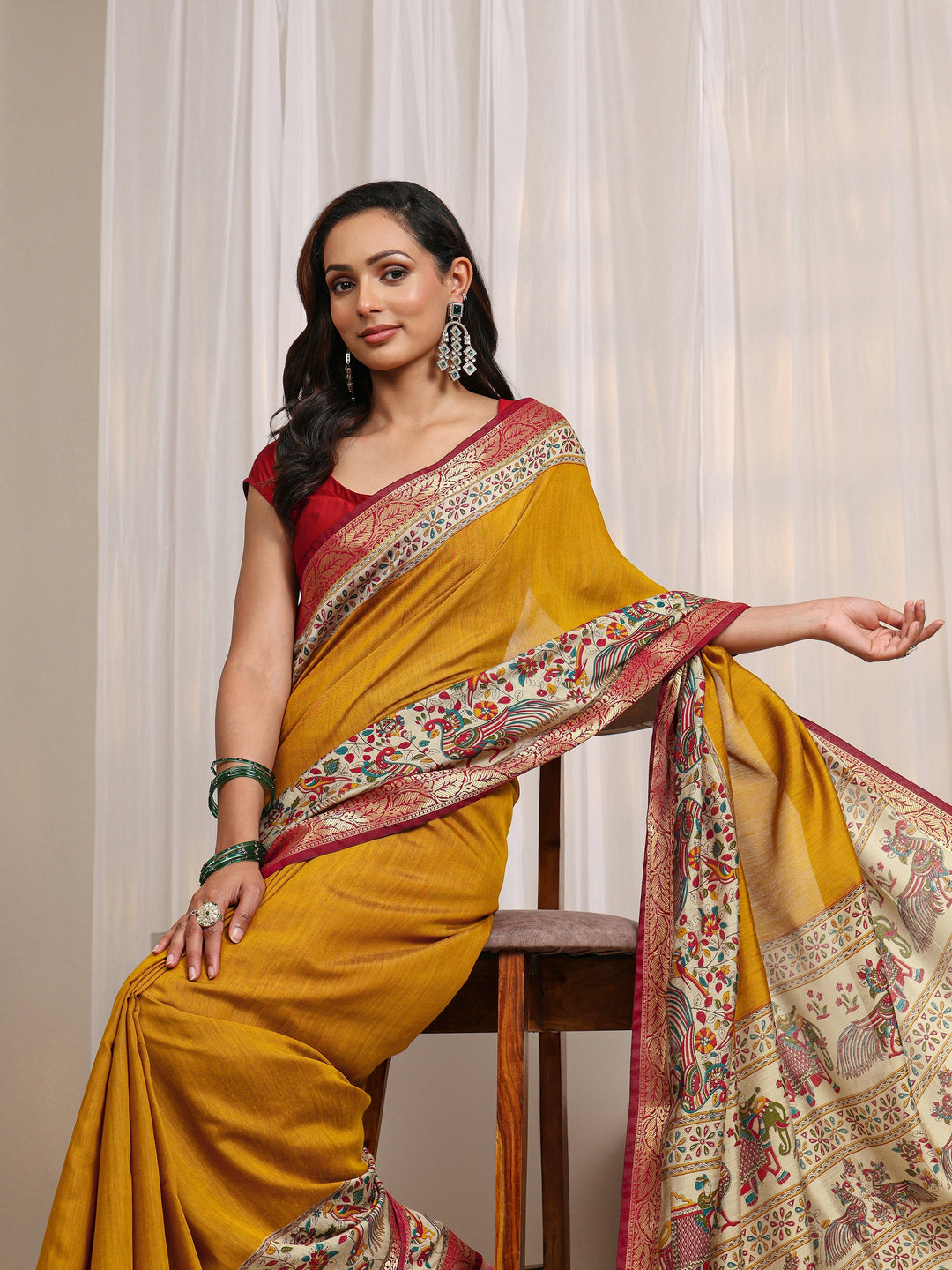 Mustard Ethnic Motif Printed Silk Blend Saree 
With Unstitched Blouse Piece