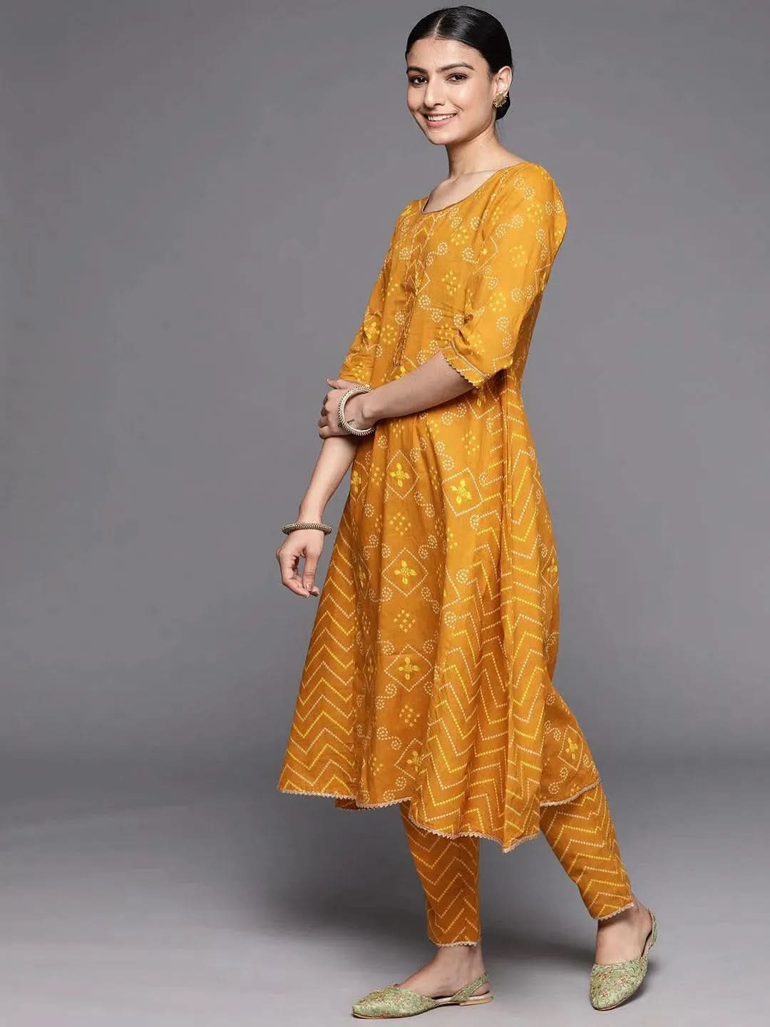 

Buy Mustard Printed Cotton Suit Set - 33126O-XS | Libas Ethnic Wear Online