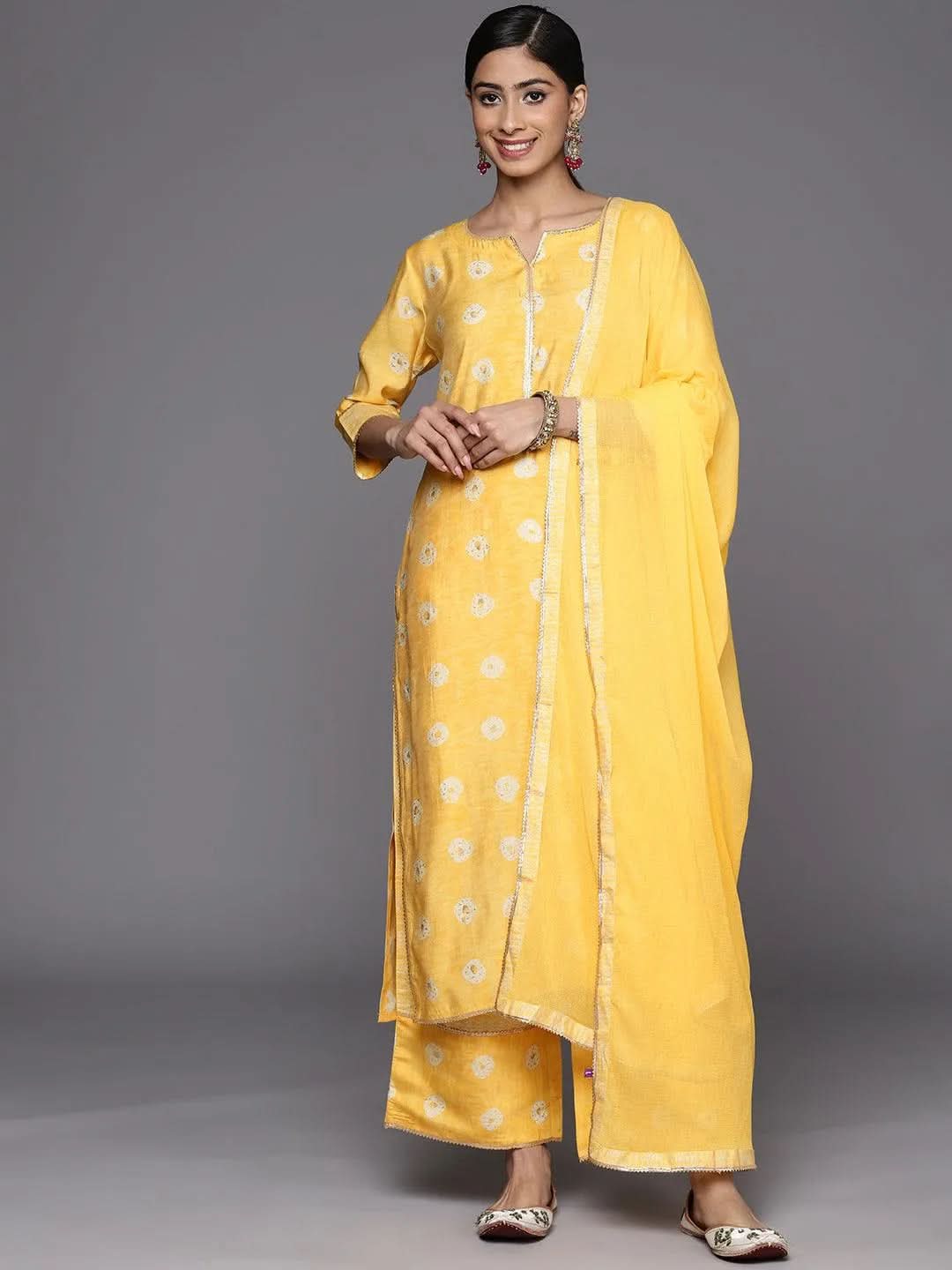 

Mustard Printed Silk Blend Straight Kurta With Palazzos & Dupatta