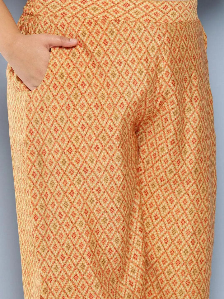 Mustard Printed Silk Blend Straight Kurta With Trousers and Dupatta - Libas