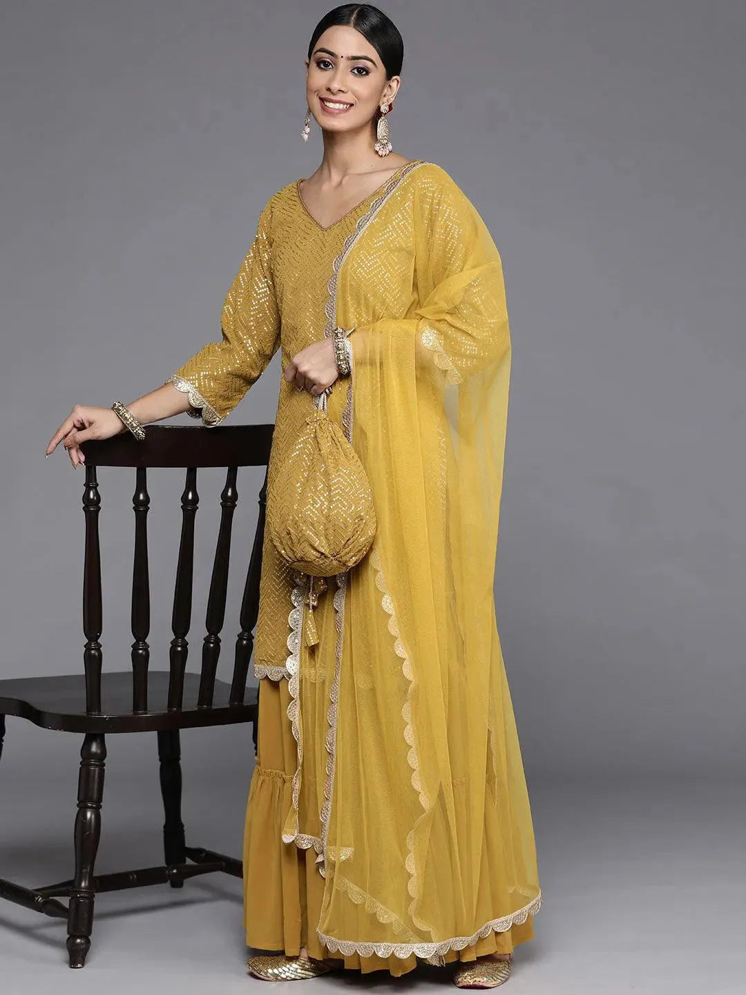 Mustard Sequinned Georgette Straight Sharara Suit Set With Potli - Libas 