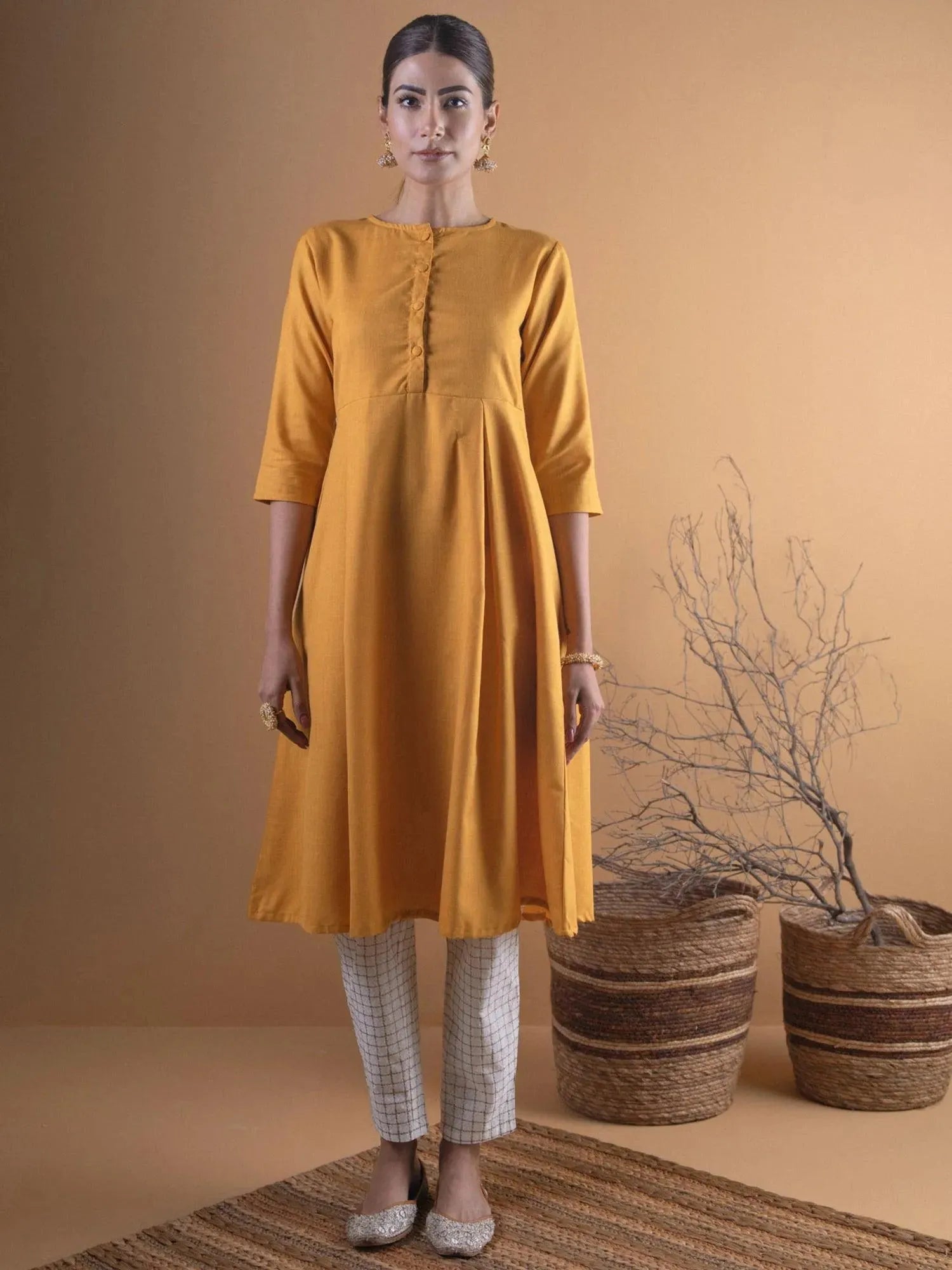 

Mustard Solid Cotton Kurta