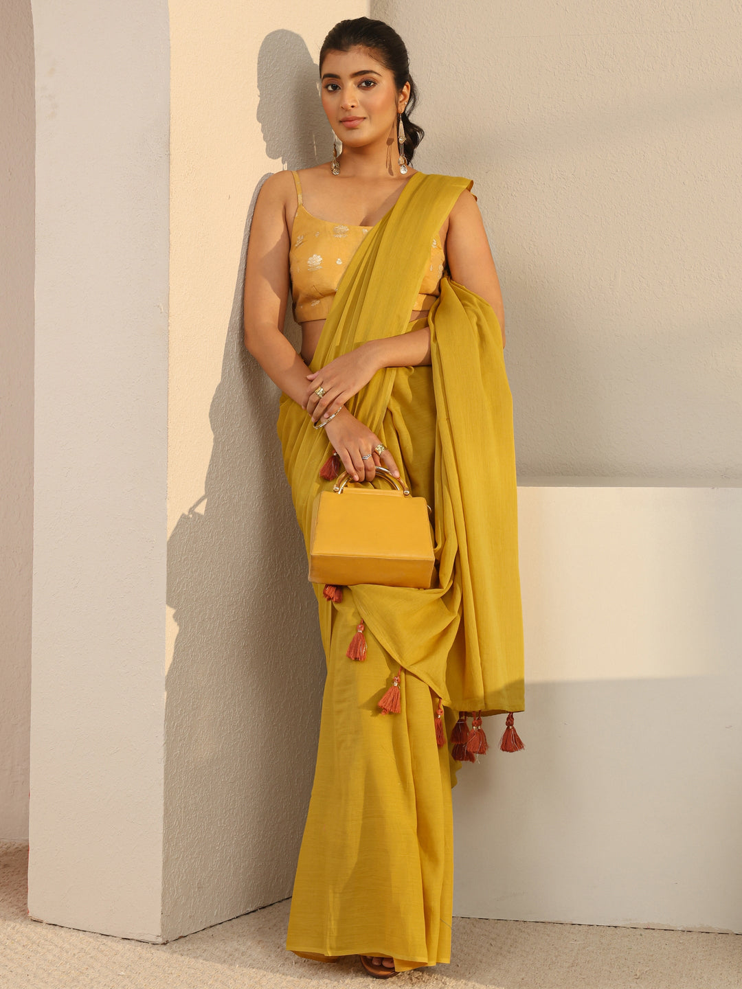 Mustard Solid Cotton Tassel Saree With Unstitched Blouse Piece