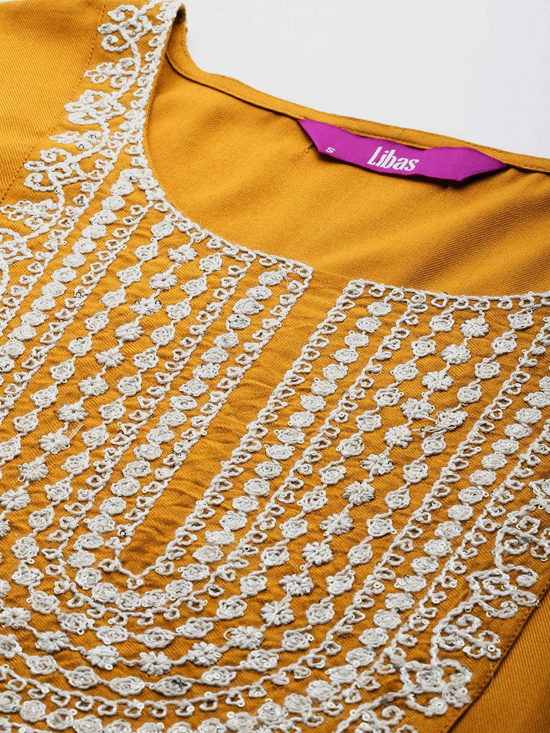 Mustard Yoke Design Wool Blend Straight Kurta With Trousers - Libas