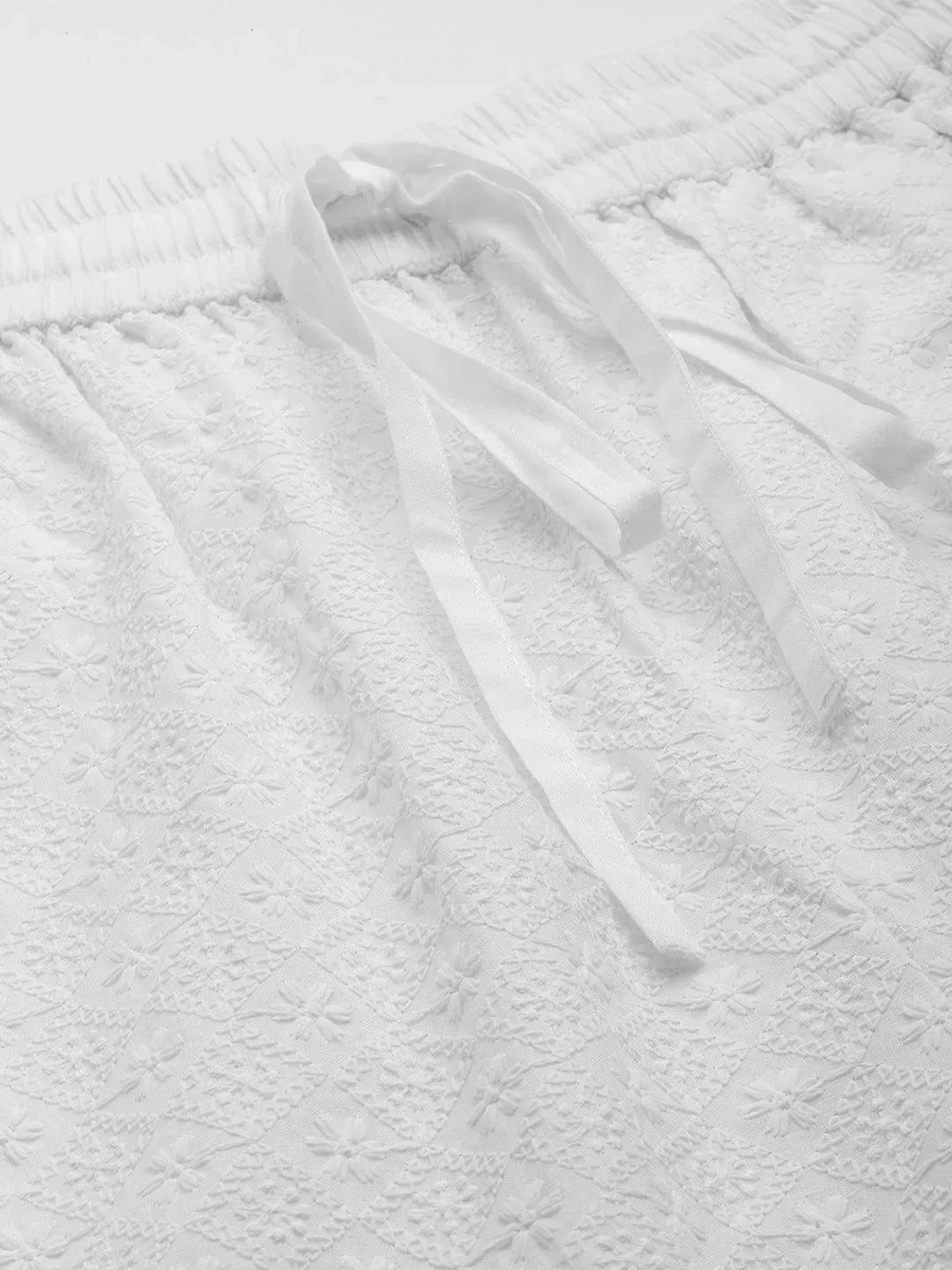 

Off White Embroidered Cotton Palazzos