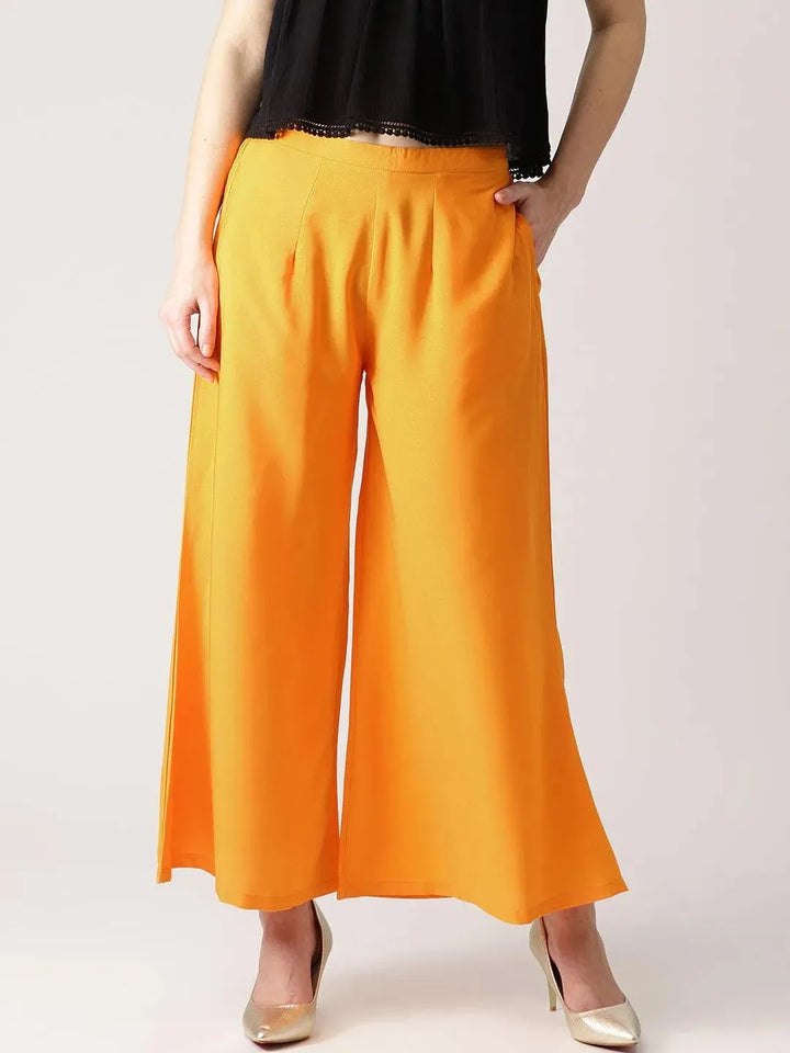 Orange Solid Crepe Palazzos - Libas
