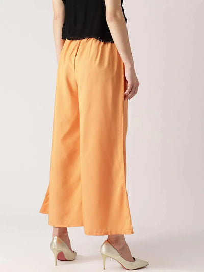 Orange Solid Crepe Palazzos - Libas