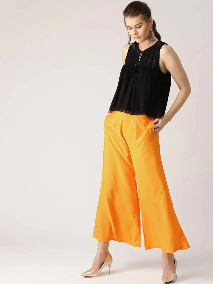 Orange Solid Crepe Palazzos - Libas