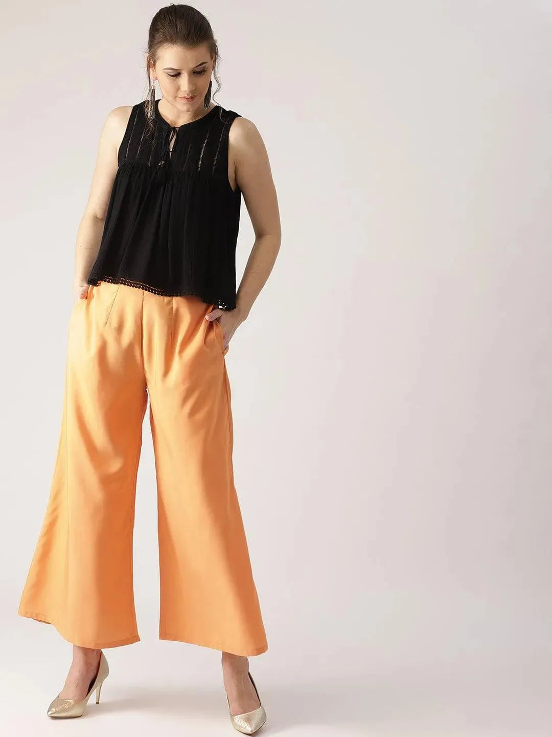 Orange Solid Crepe Palazzos - Libas