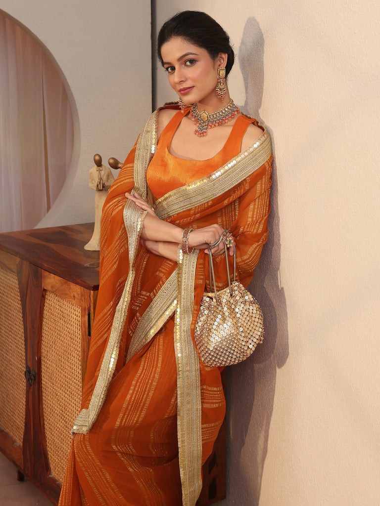 Libas Orange Striped Textured Chiffon Saree