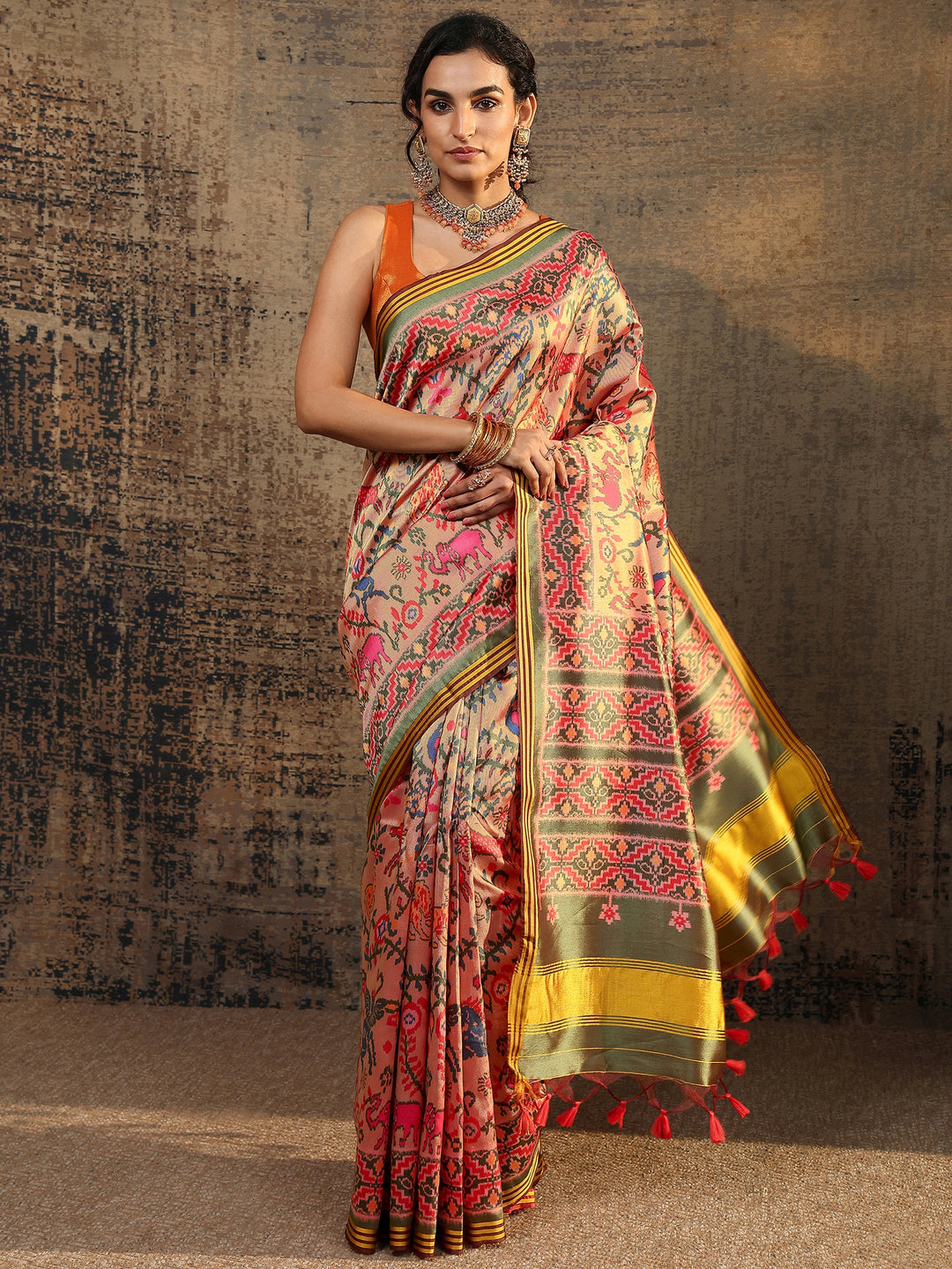 Peach Ikat Printed Silk Saree With Unstitched Blouse Piece