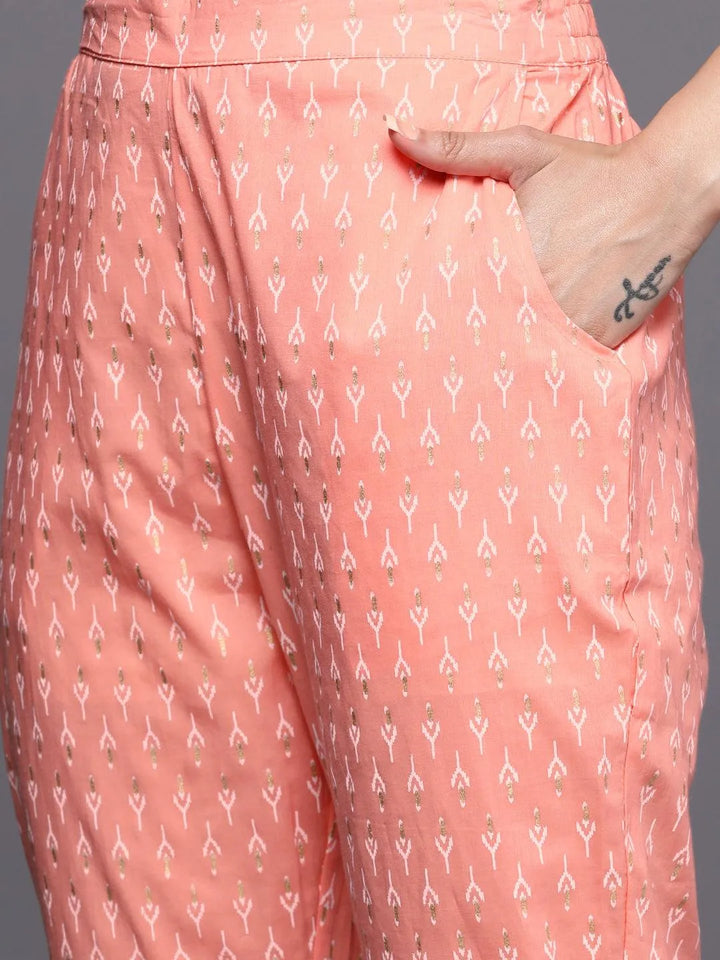 Peach Yoke Design Cotton A-Line Suit Set With Trousers - Libas