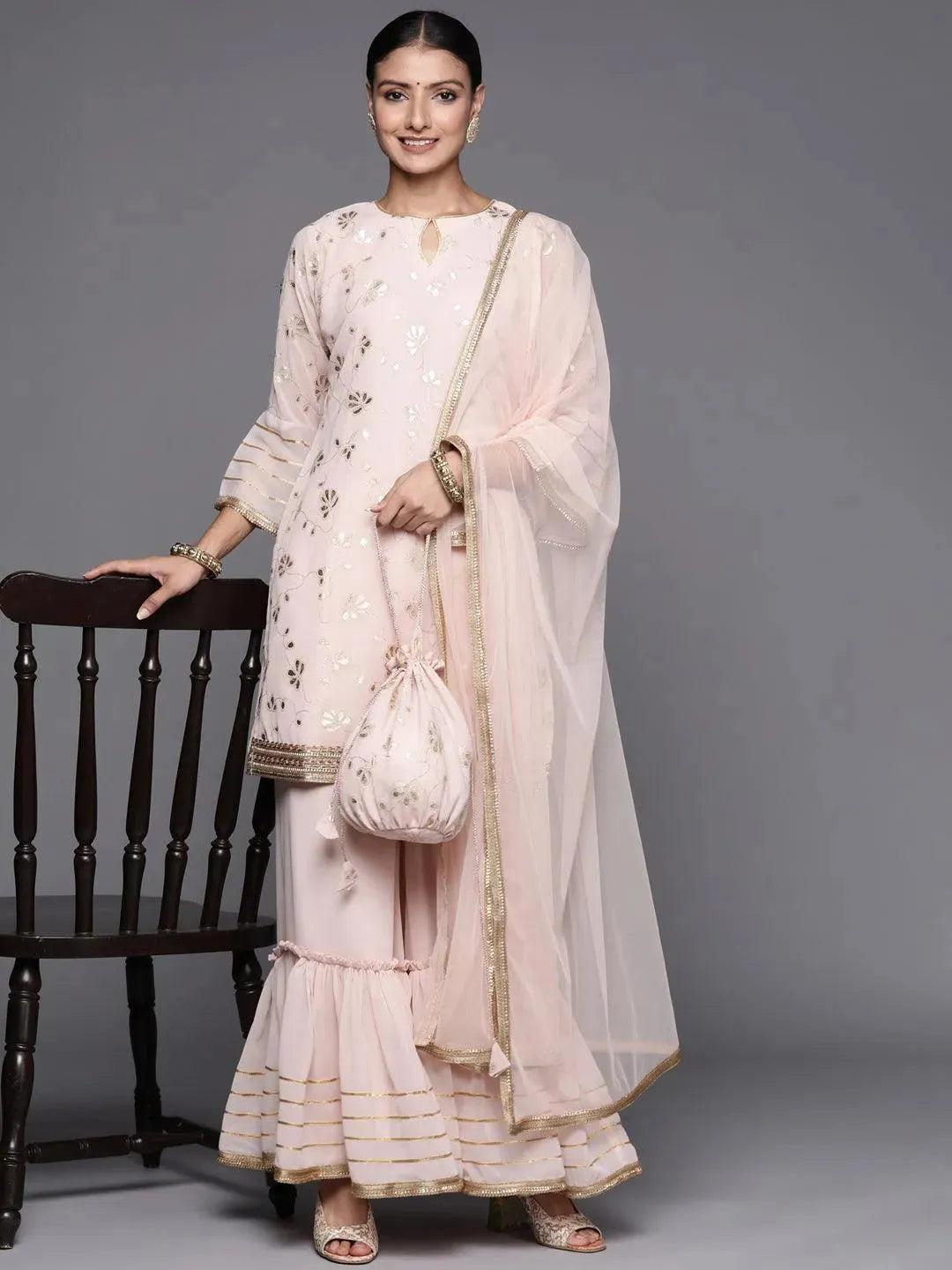 Pink Printed Georgette Straight Suit Set With Potli - Libas 