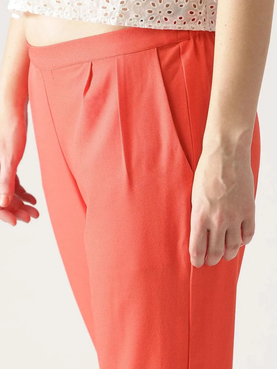 

Pink Solid Polyester Trousers