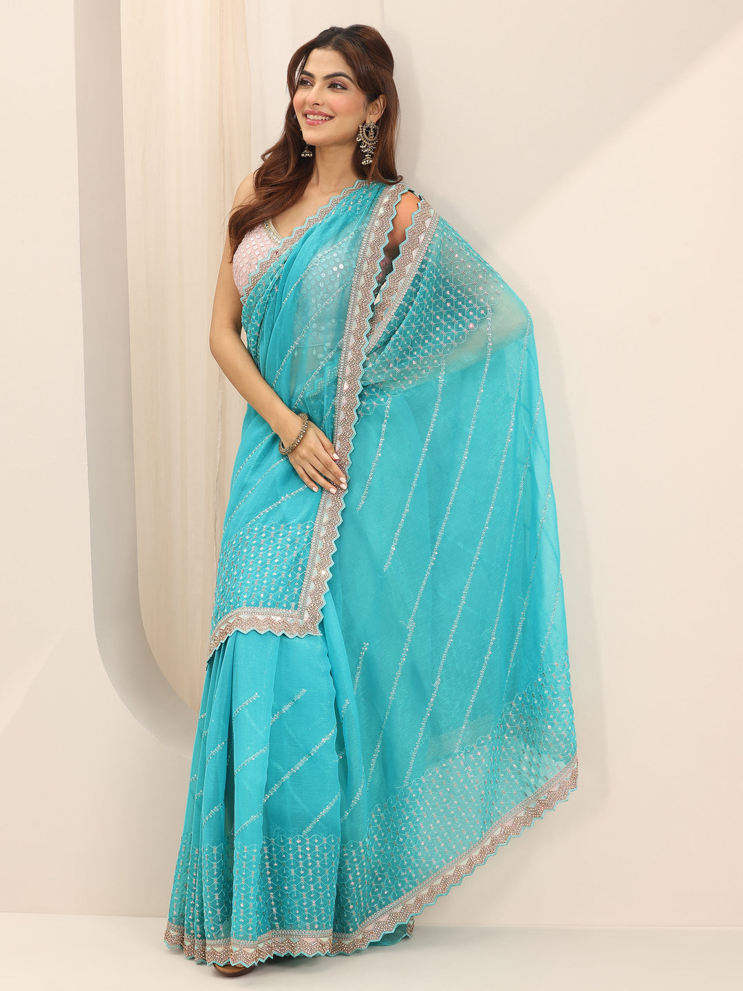  Turquoise blue Printed Silk Chiffon Saree With Unstitched Blouse Piece 