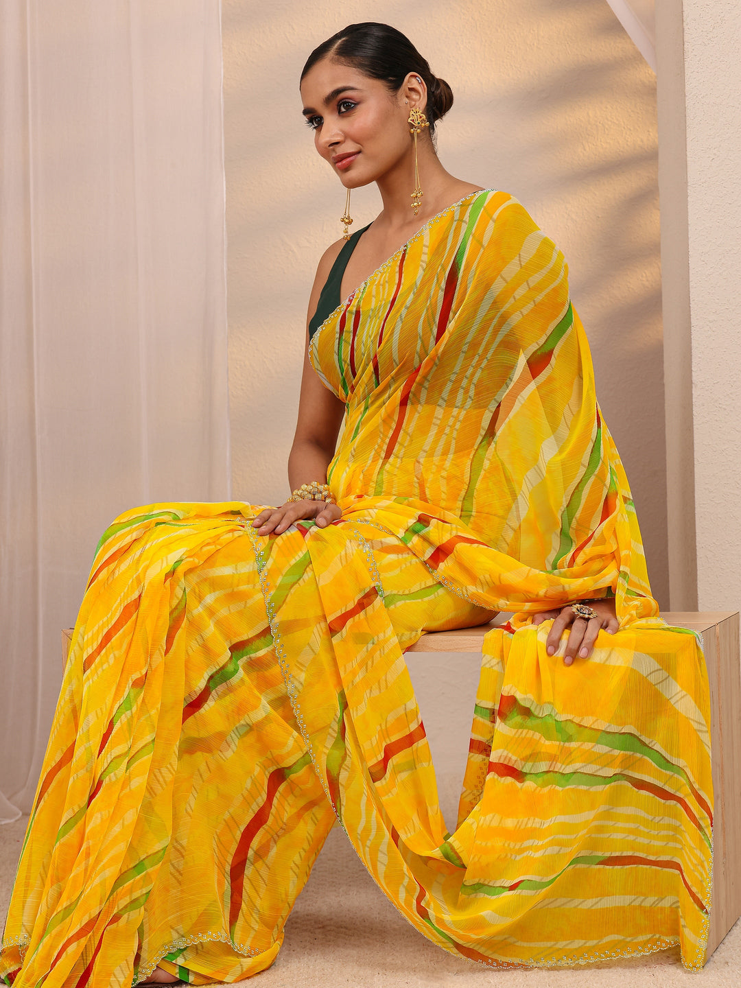 Yellow Leheriya Printed Silk Blend Saree 
With Unstitched Blouse Piece