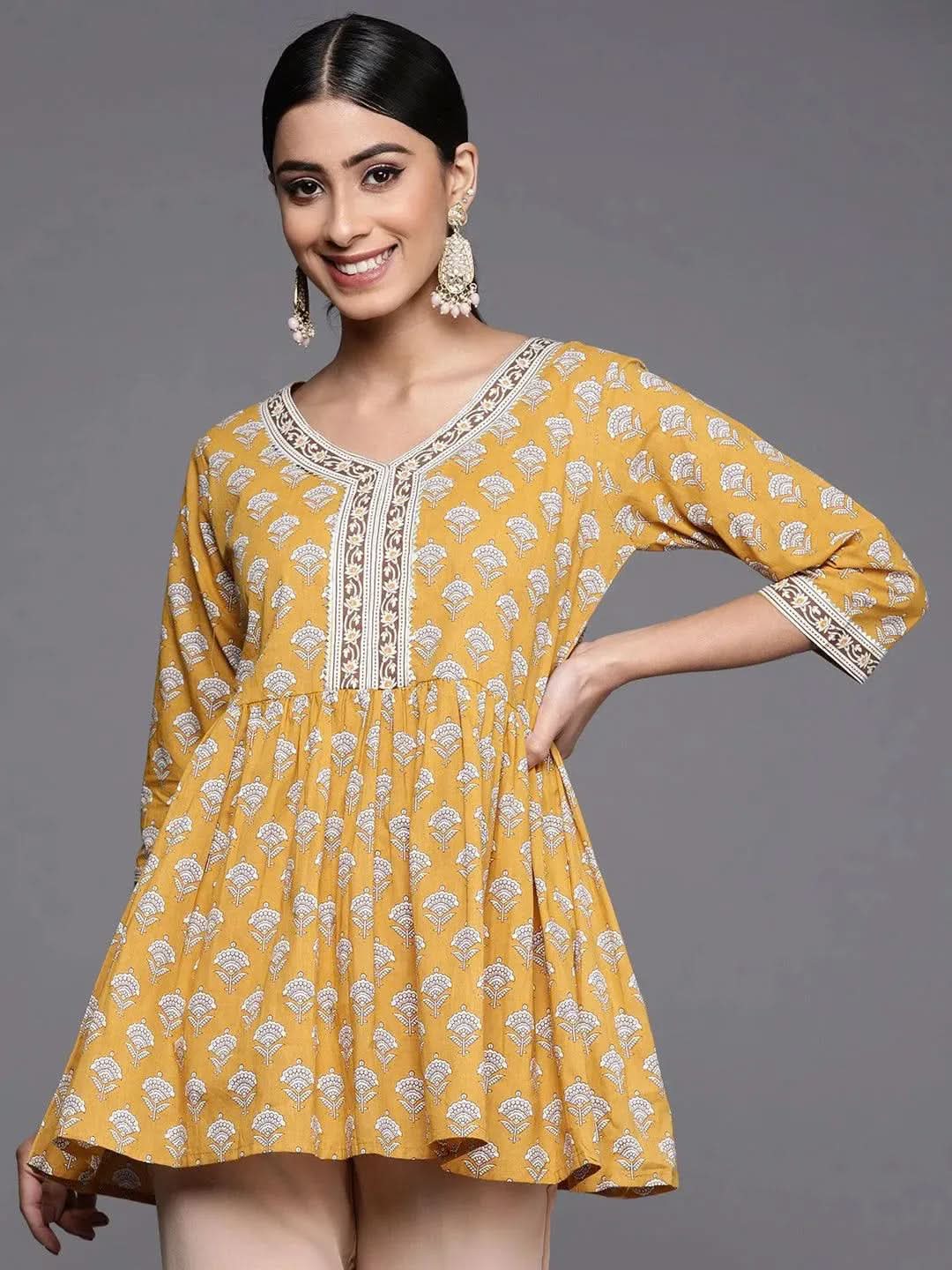 

Yellow Printed Cotton A-Line Kurti