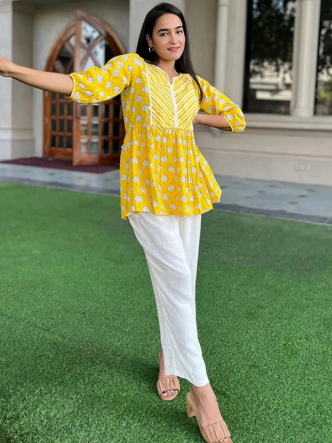 Yellow Printed Cotton A-Line Kurti