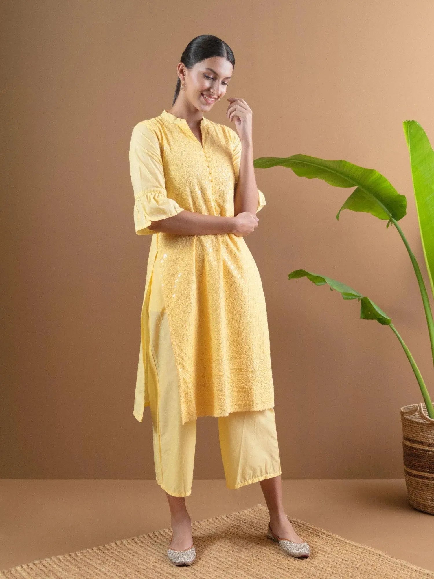 

Buy Yellow Schiffli Straight Kurta With Palazzo Online | Libas