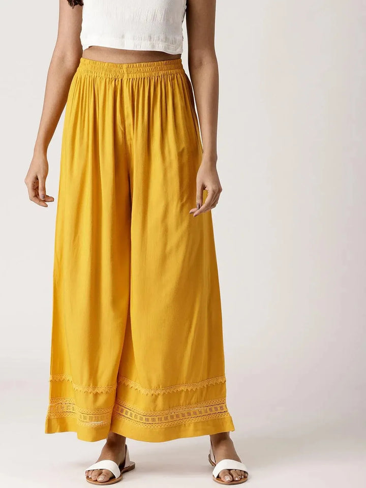 Yellow Solid Rayon Palazzos - Libas