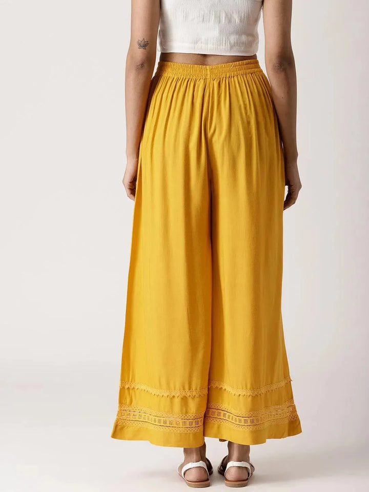 Yellow Solid Rayon Palazzos - Libas