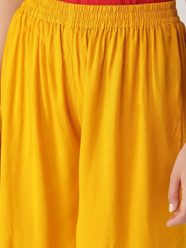 Yellow Solid Rayon Palazzos - Libas